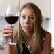 A pretty blonde girl shits in her glass of fine wine and then mixes it up with a fork. About 5 minutes.